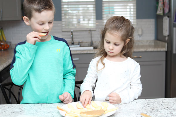 children assembling octopus snack