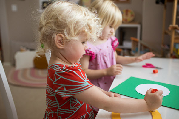 children assembling lowercase c craft