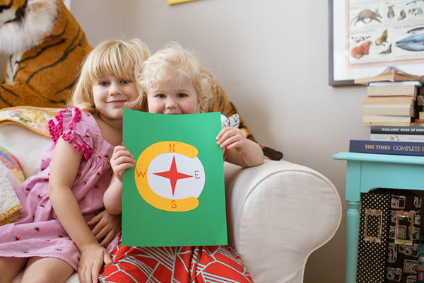 children show off their lowercase c craft