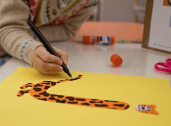 child colors spots on lowercase j craft