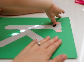 mom and child assemble lowercase k craft