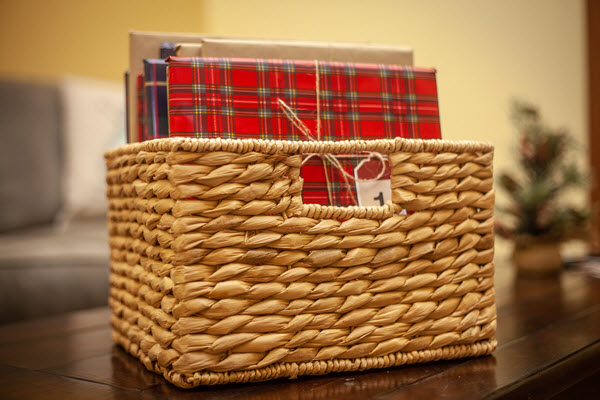 wrapped books in a basket for book advent calendar