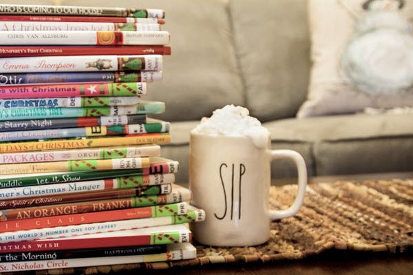 Stack of picture books with hot cocoa