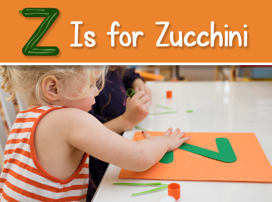 child works on her lowercase z craft