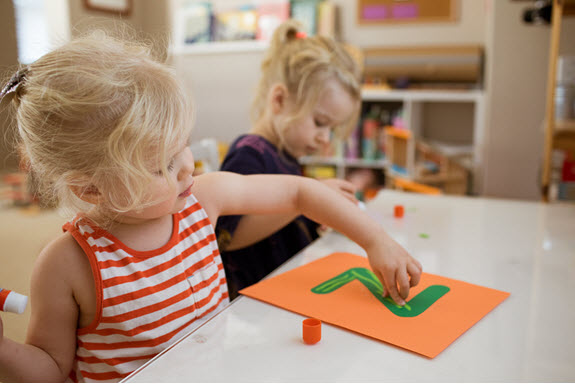 children work on their lowercase z craft