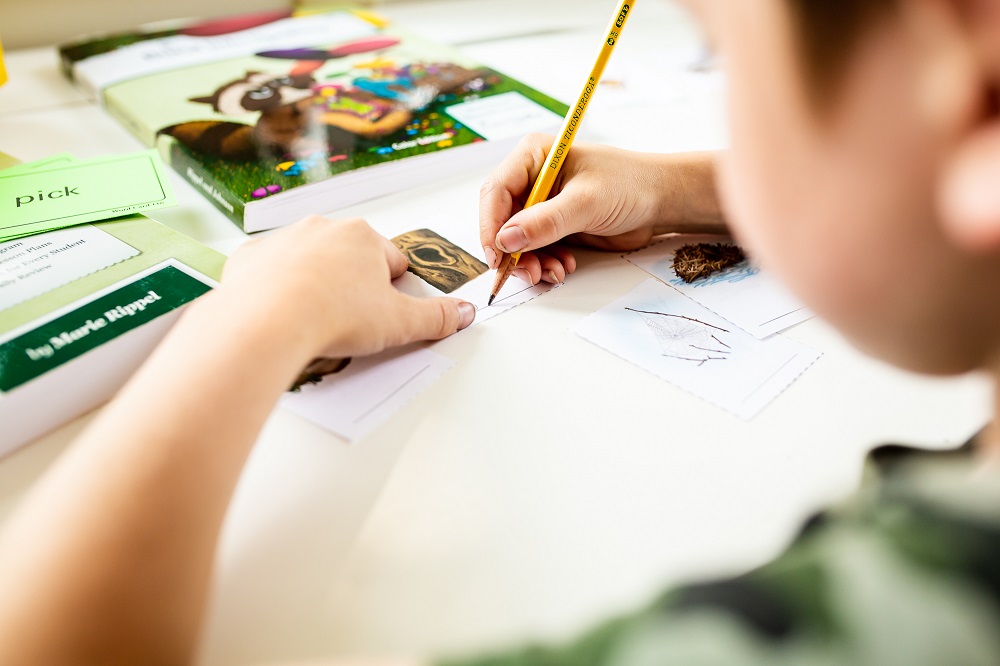 Child practicing spelling